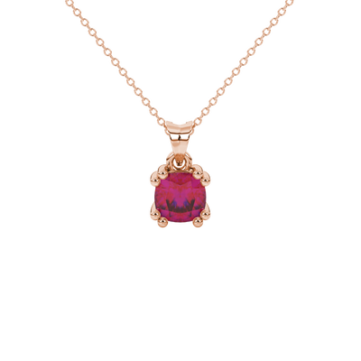 Red cushion cut gemstone pendant in floral crown gold setting
