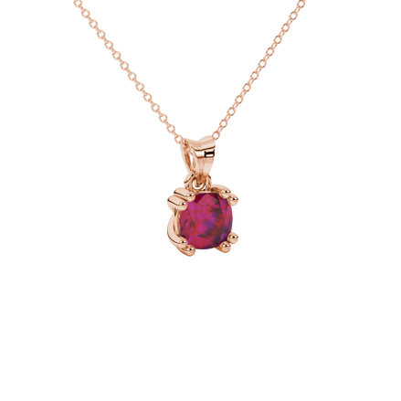 Red cushion cut gemstone pendant in floral crown gold setting