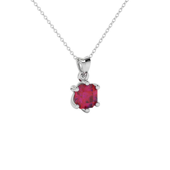 close-up of a radiant raspberry red gemstone enclosed in a white gold six-prong pendant setting.