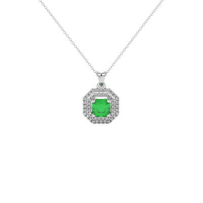 Radiant-cut emerald green gemstone pendant in a white gold falling edge halo setting
