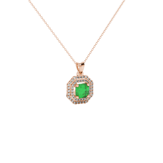 close-up shot of a radiant emerald green gemstone pendant with a rose gold halo gallery.