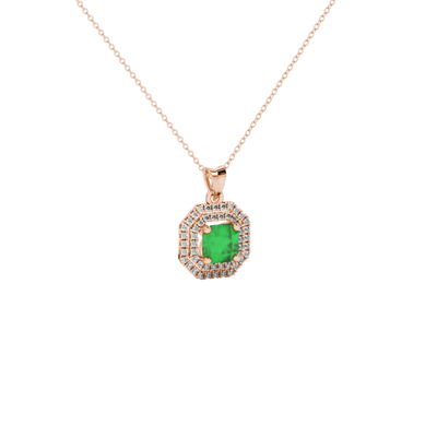 close-up shot of a radiant emerald green gemstone pendant with a rose gold halo gallery.