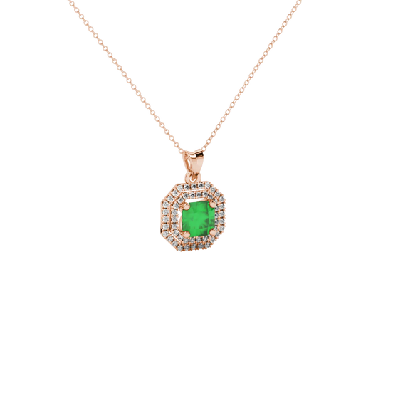 close-up shot of a radiant emerald green gemstone pendant with a rose gold halo gallery.