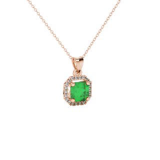 close-up shot of radiant-cut emerald green gemstone stud earrings with a rose gold french pavé halo gallery.