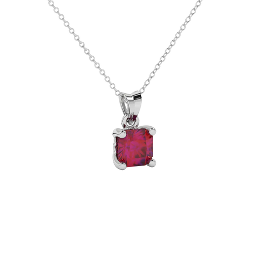 close-up of a radiant raspberry red gemstone enclosed in a white gold lotus basket pendant setting.