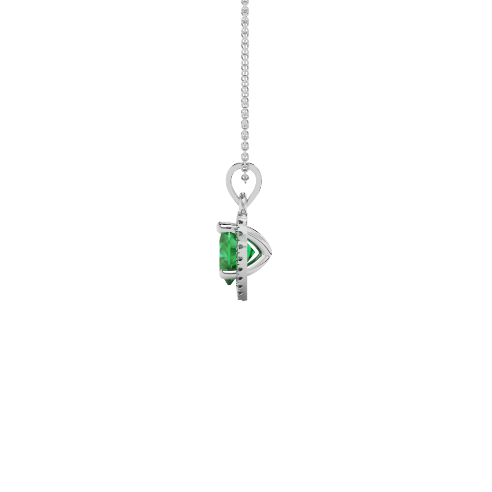 Side view of Emerald Green heart cut gemstone halo pendant in white gold showcasing the prong setting