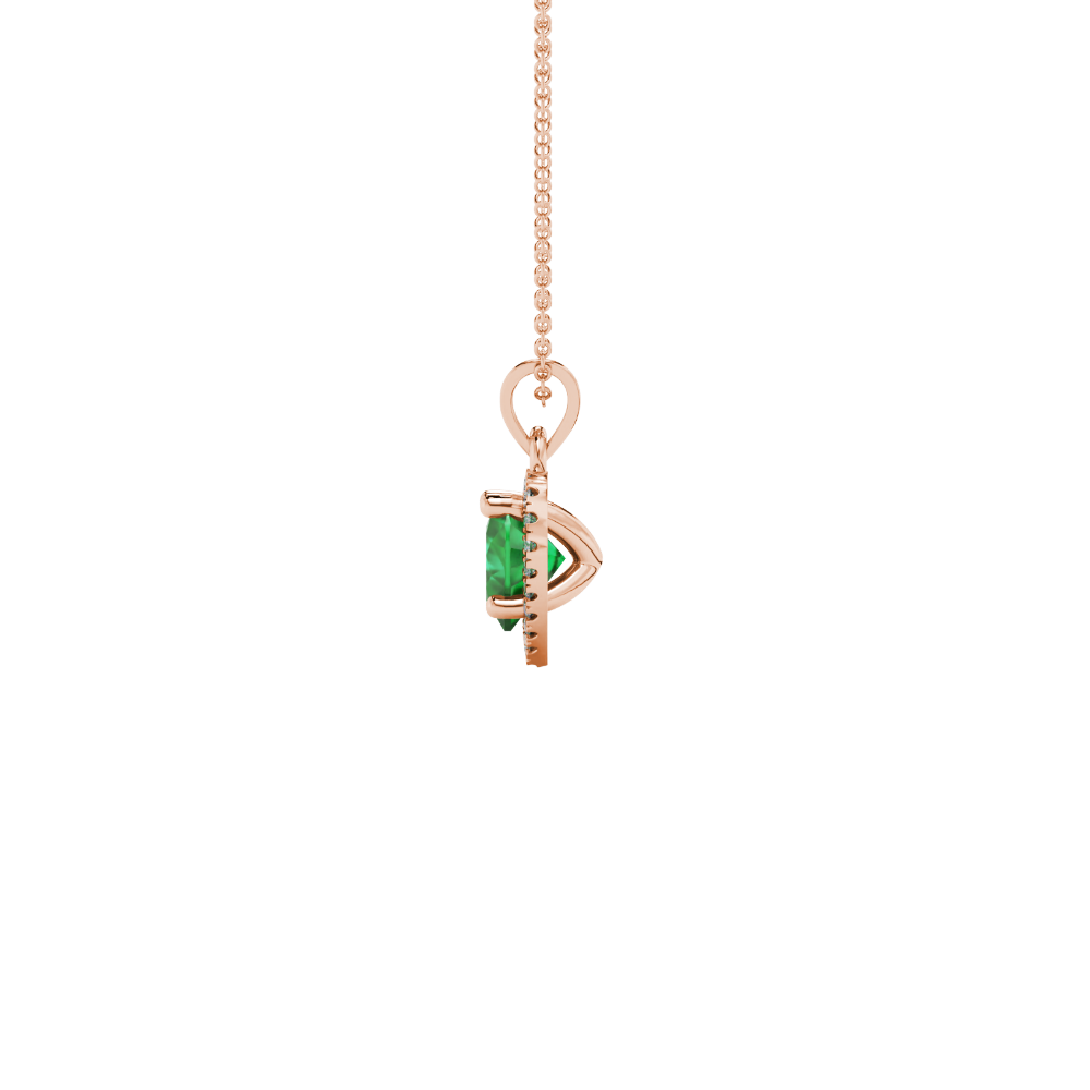 Side view of Emerald Green heart cut gemstone halo pendant in rose gold 