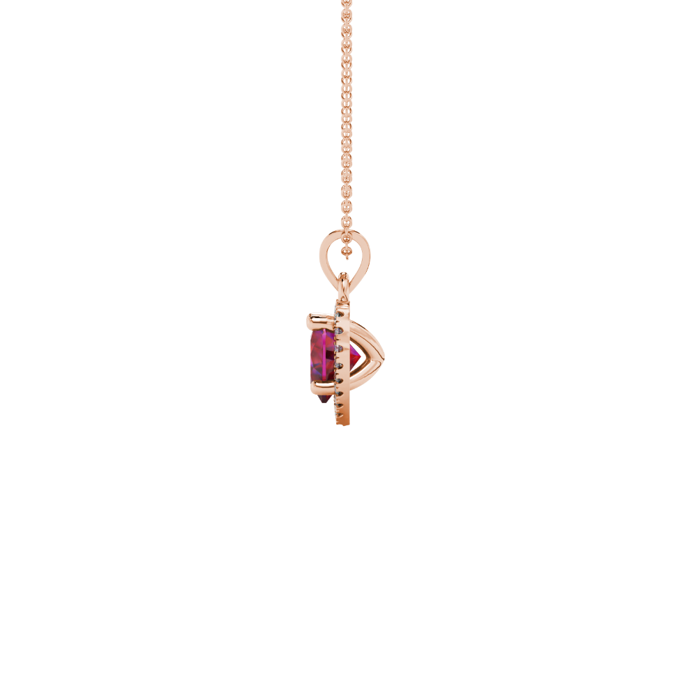 Side view of Raspberry Red heart cut gemstone halo pendant in rose gold