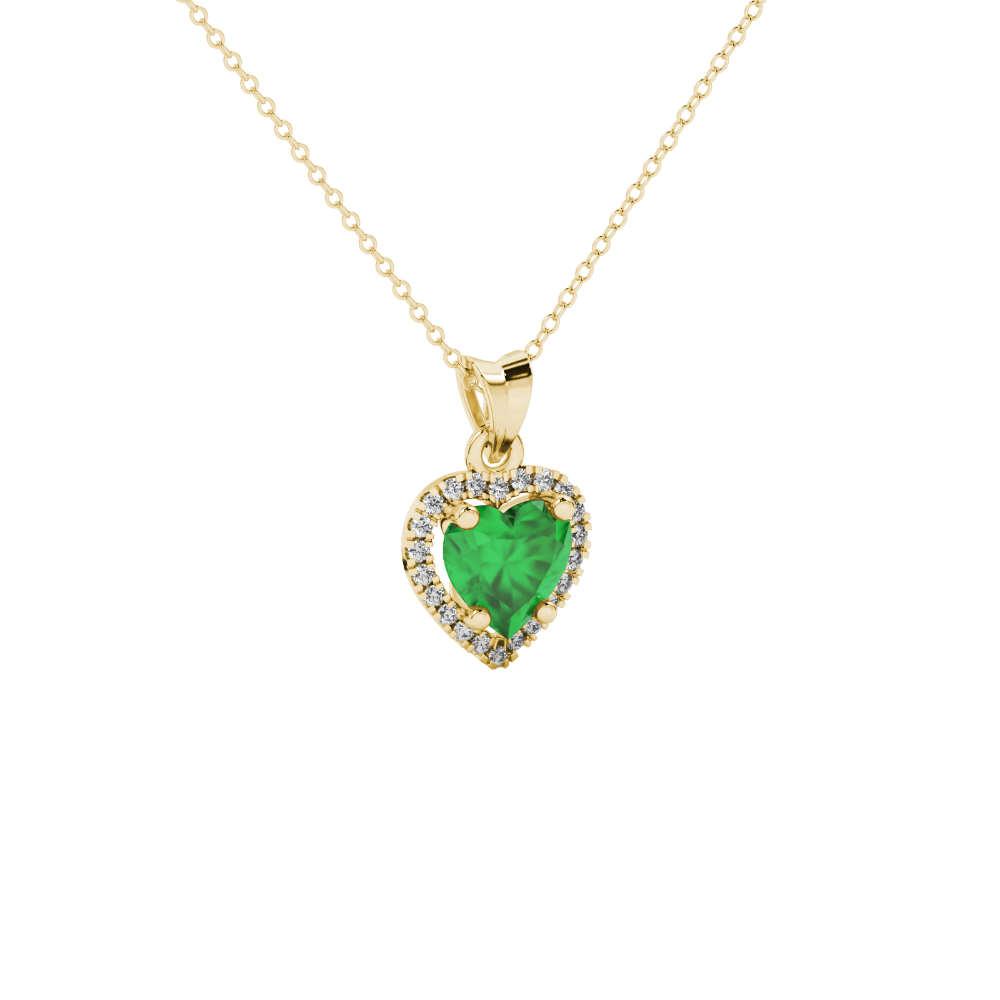 Close-up angled shot of Emerald Green heart cut halo pendant in yellow gold