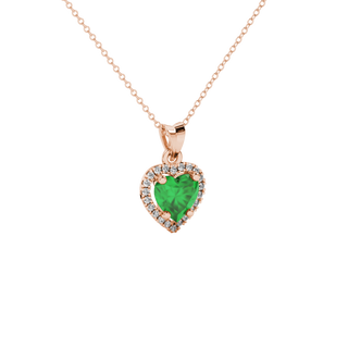 Close-up angled shot of Emerald Green heart cut halo pendant in rose gold