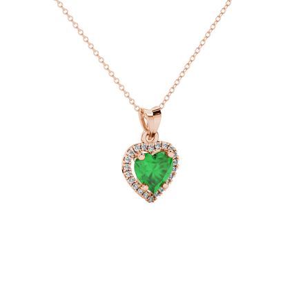 Close-up angled shot of Emerald Green heart cut halo pendant in rose gold
