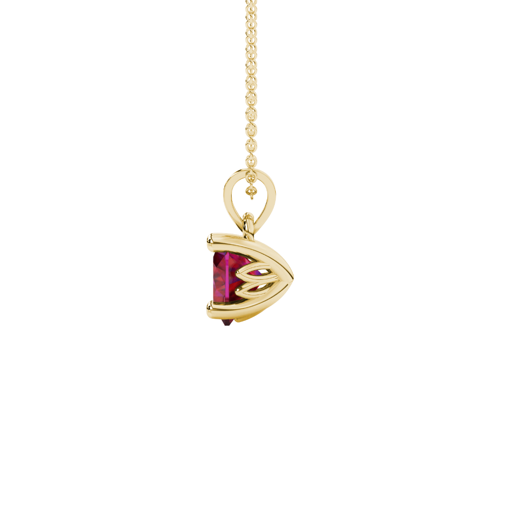 Side view of Raspberry Red heart cut gemstone pendant showcasing the yellow gold