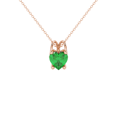 Close-up angled shot of Emerald Green heart cut pave basket halo pendant in rose gold