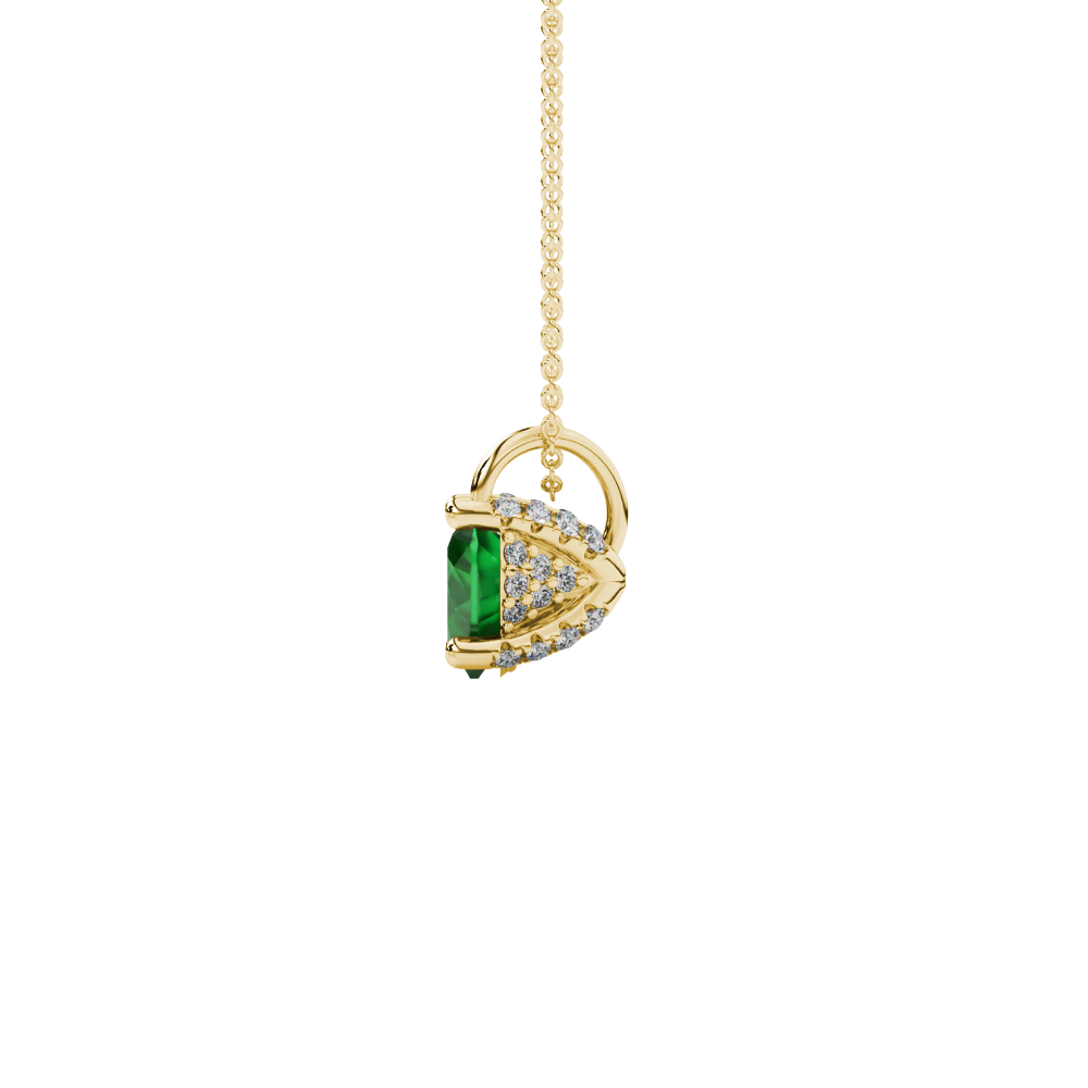 Side view of Emerald Green heart cut gemstone pendant showcasing the yellow gold