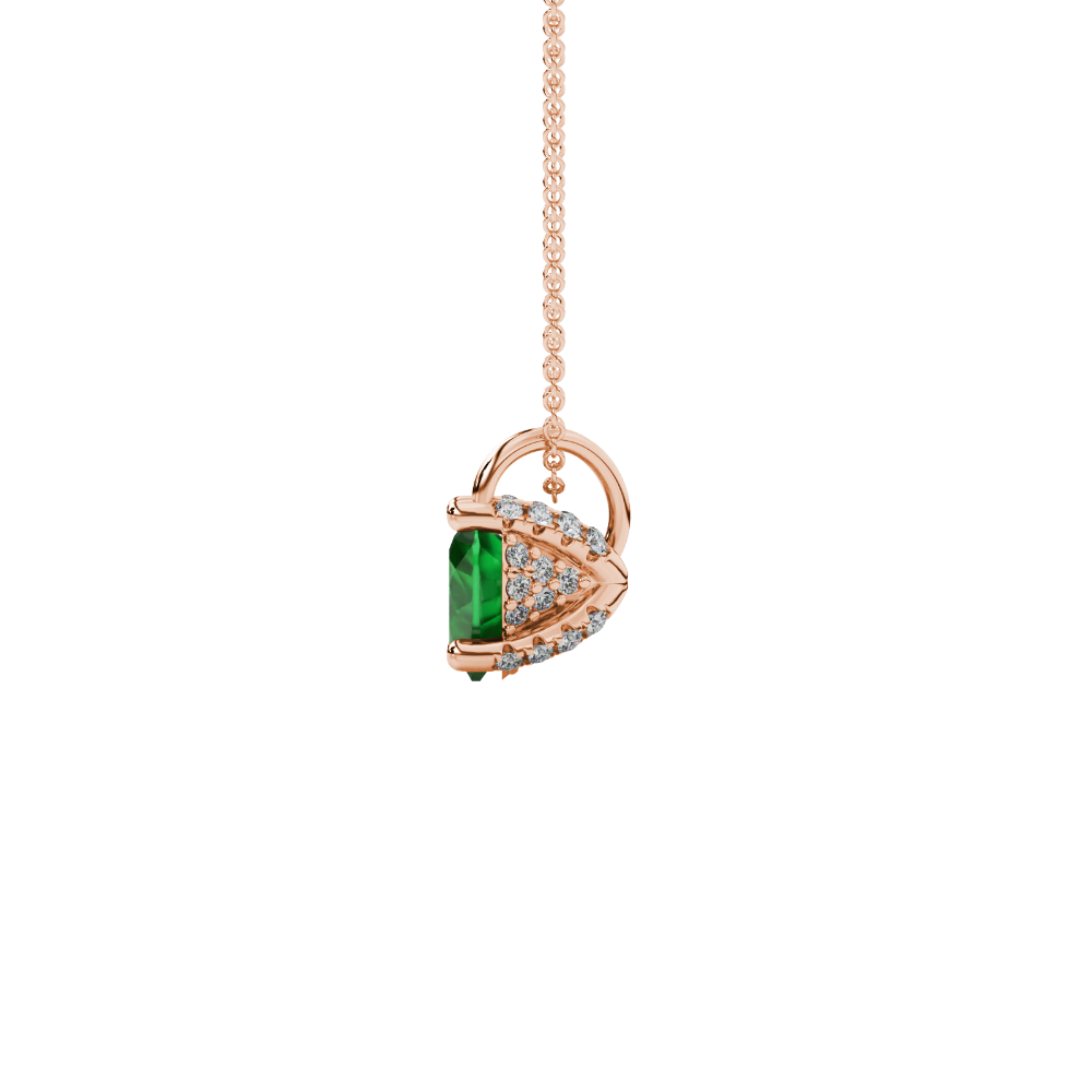 Side view of Emerald Green heart cut gemstone pendant showcasing the rose gold