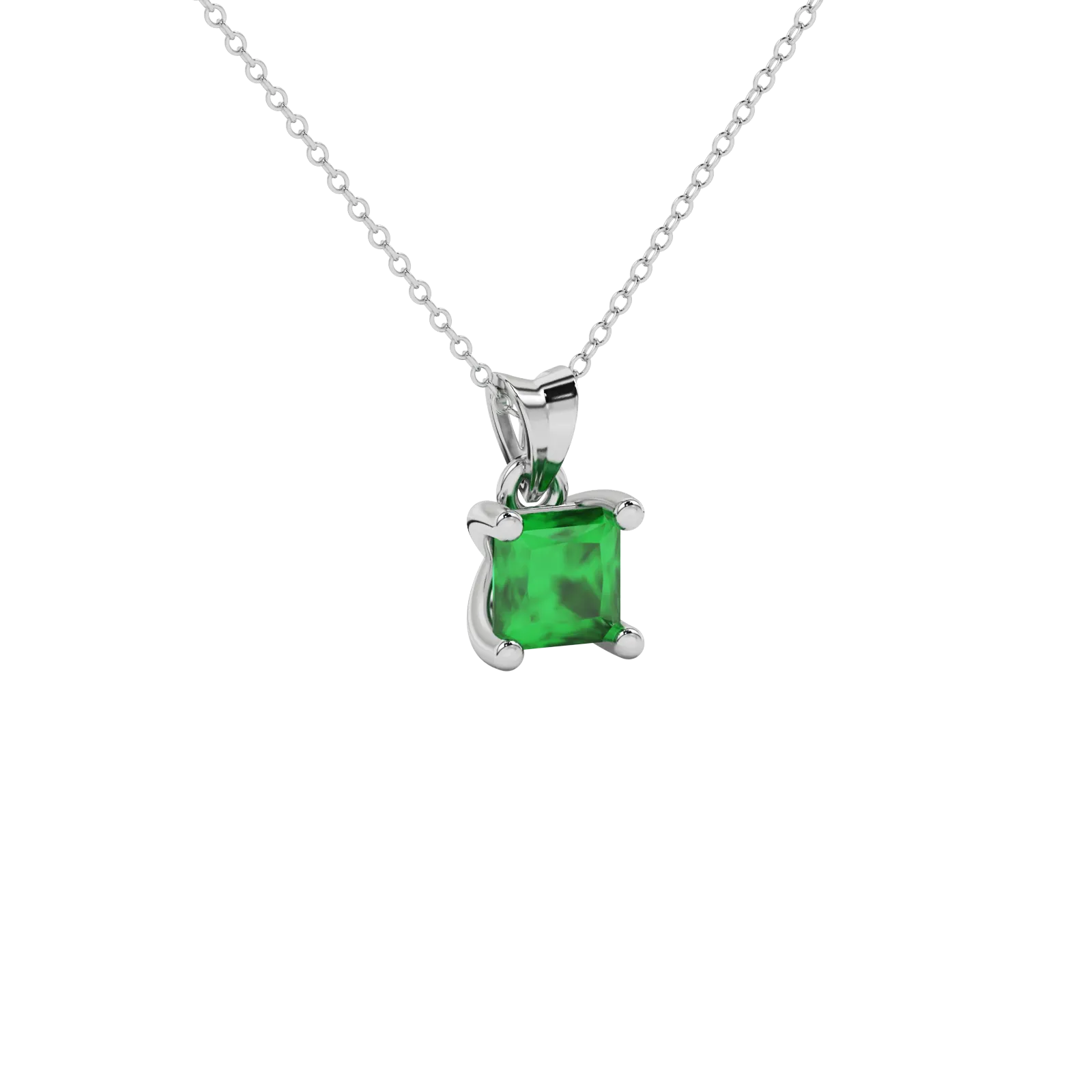 Close-up emerald green gemstone pendant, white gold four-prong setting.