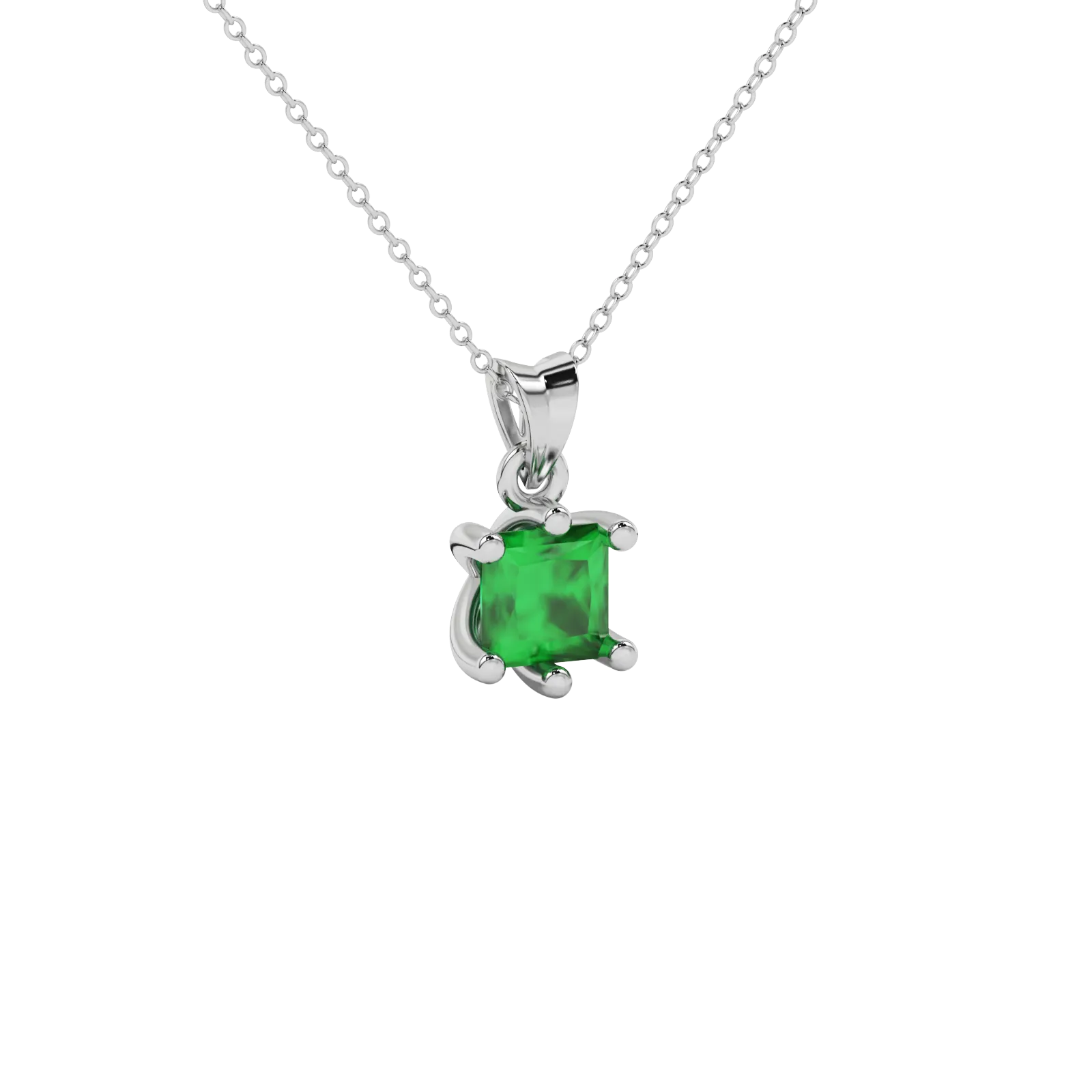 Close-up emerald green gemstone pendant, white gold six-prong setting.