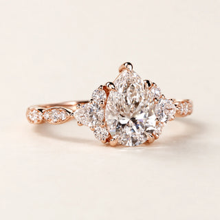 Pear Cut Lab Grown Diamond Three-Stone Engagement Ring in Rose Gold