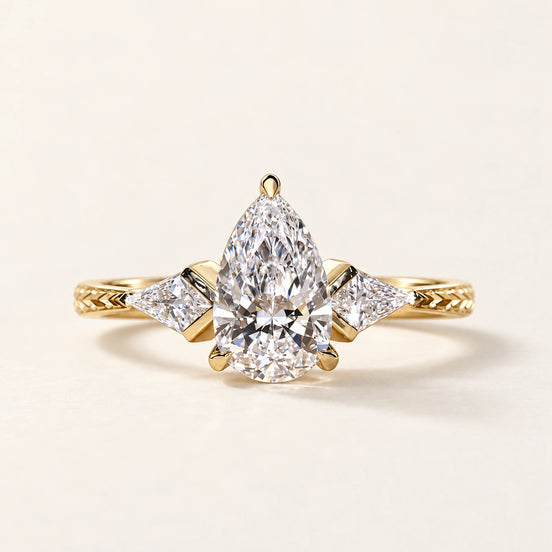 Deco Pear Cut Lab Grown Diamond Three-Stone Engagement Ring in Yellow Gold