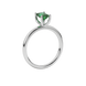 Emerald cut green gemstone solitaire ring in gold four prong setting