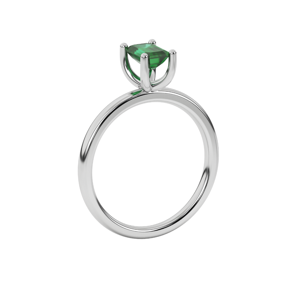 Emerald cut green gemstone solitaire ring in gold four prong setting