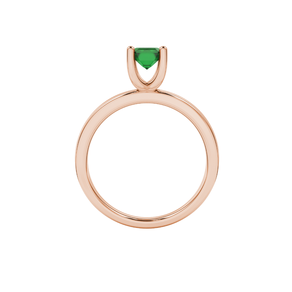 Emerald cut green gemstone solitaire ring in gold four prong setting