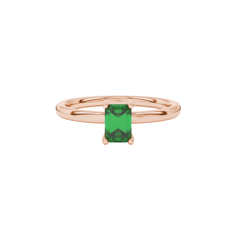 Emerald cut green gemstone solitaire ring in gold four prong setting
