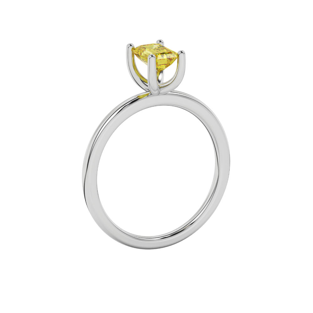 Emerald cut yellow gemstone solitaire ring in gold four prong setting