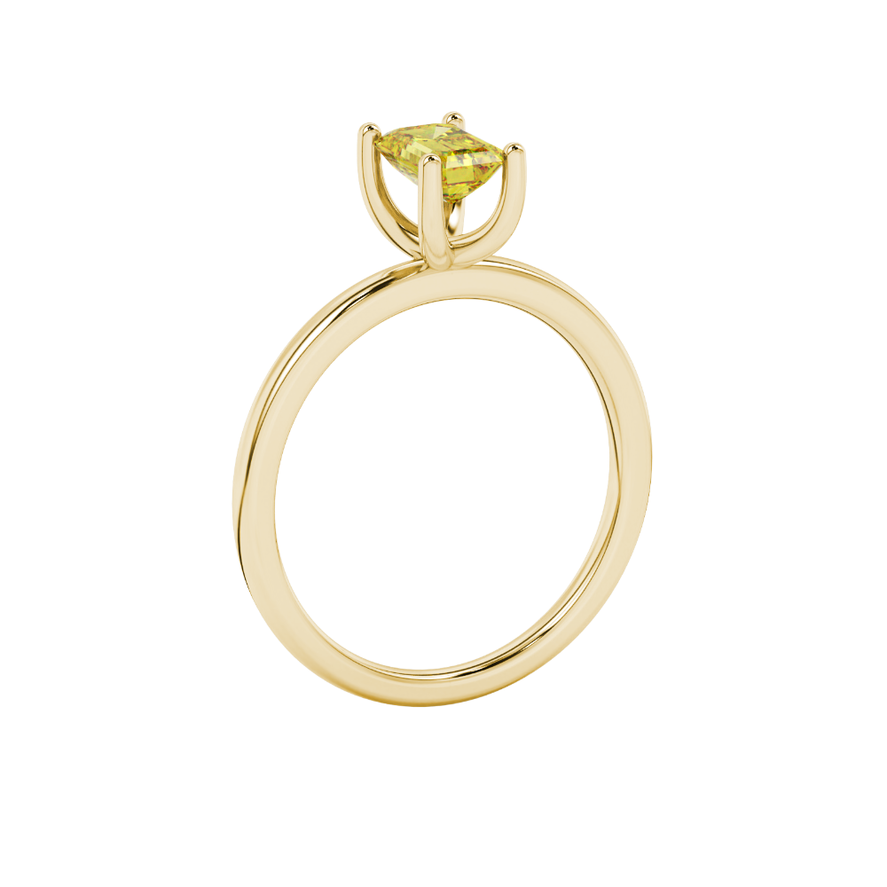Emerald cut yellow gemstone solitaire ring in gold four prong setting