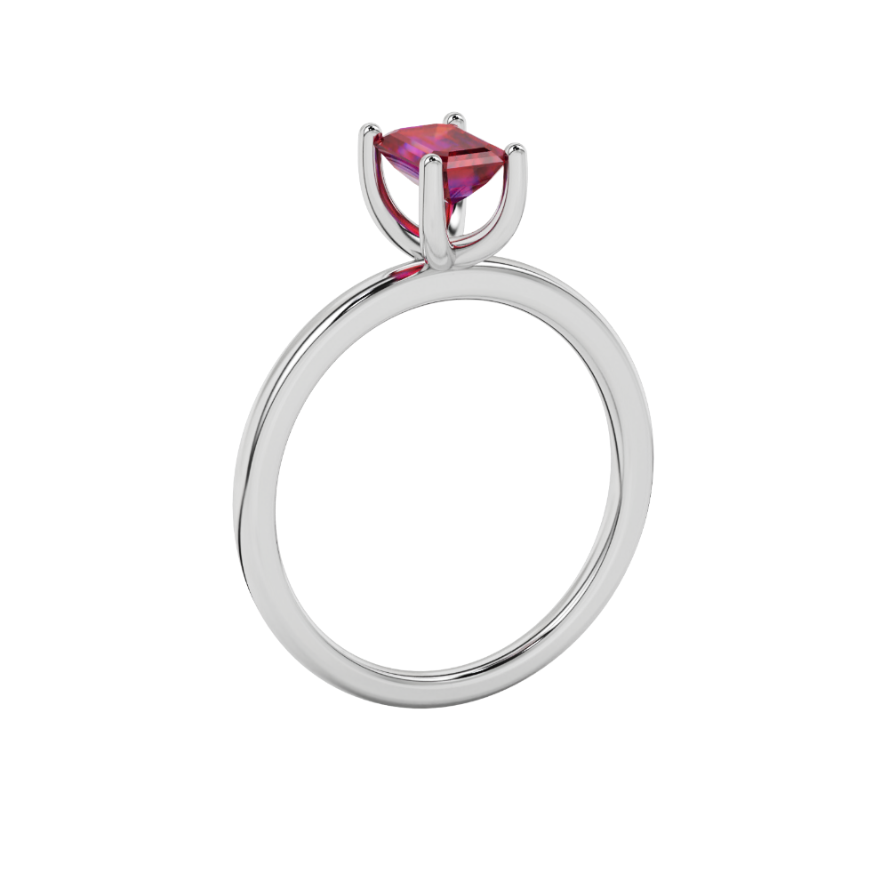 Emerald cut red gemstone solitaire ring in gold four prong setting