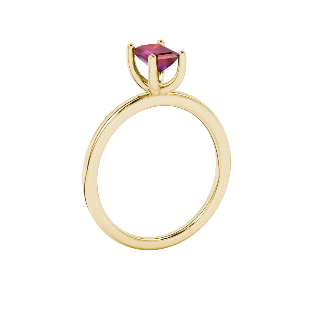 Emerald cut red gemstone solitaire ring in gold four prong setting
