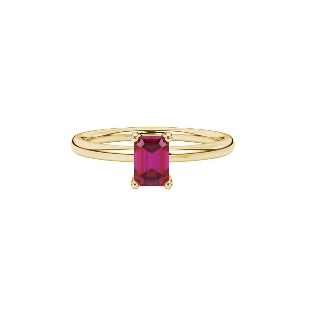 Emerald cut red gemstone solitaire ring in gold four prong setting