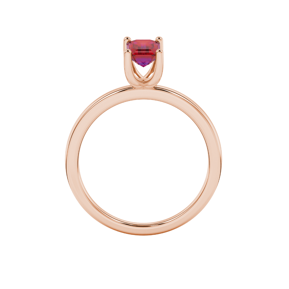Emerald cut red gemstone solitaire ring in gold four prong setting