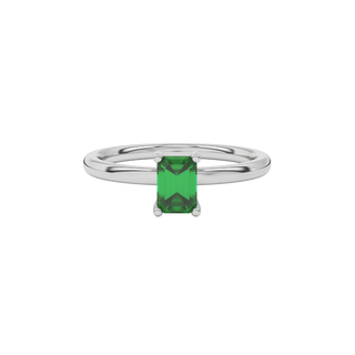 emerald green gemstone solitaire ring in white gold