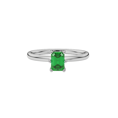 Emerald cut green gemstone solitaire ring in six prong gold setting