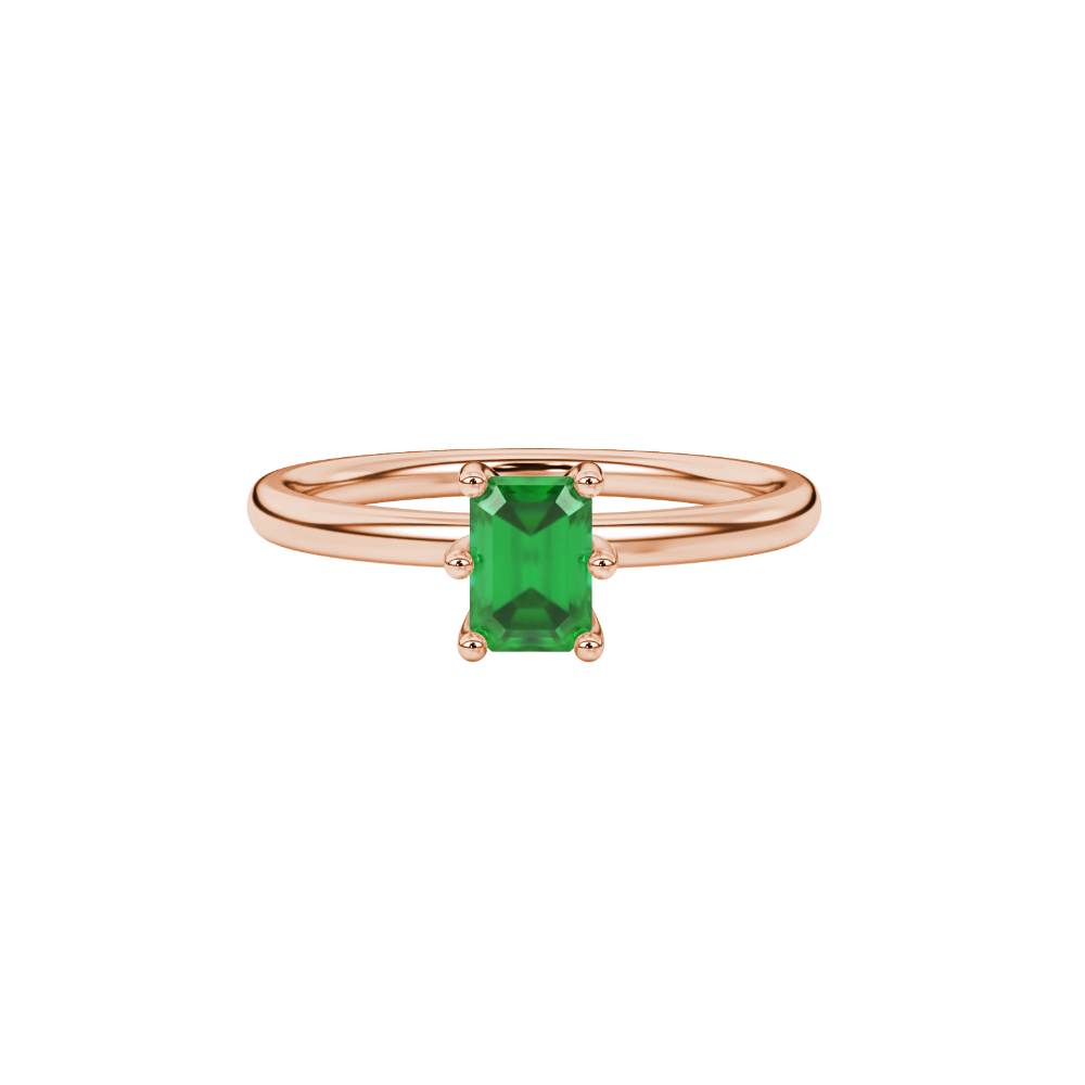 Emerald cut green gemstone solitaire ring in six prong gold setting