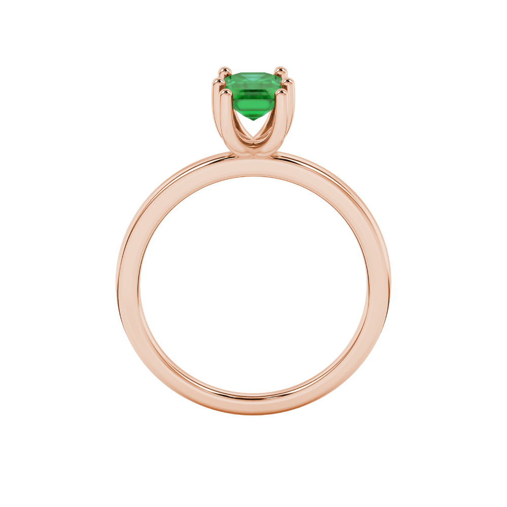 Emerald cut green gemstone solitaire ring in six prong gold setting