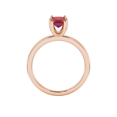 Emerald cut red gemstone solitaire ring in six prong gold setting