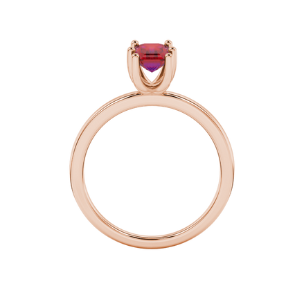 Emerald cut red gemstone solitaire ring in six prong gold setting