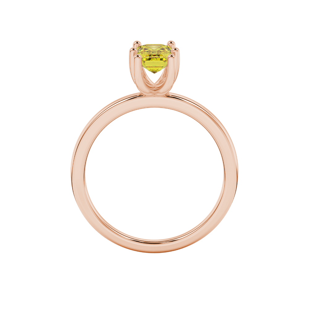 Emerald cut yellow gemstone solitaire ring in six prong gold setting