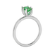 Emerald cut green gemstone solitaire ring in six prong gold setting