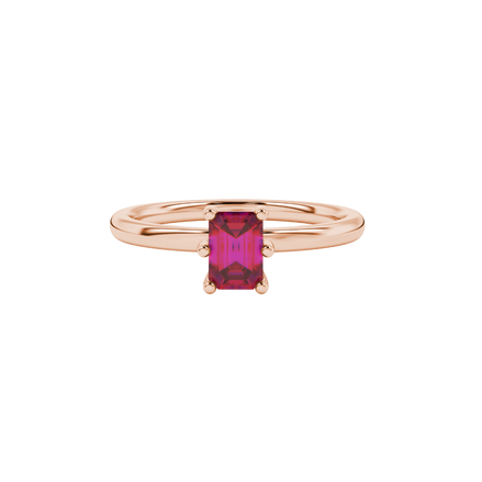 Emerald cut red gemstone solitaire ring in six prong gold setting