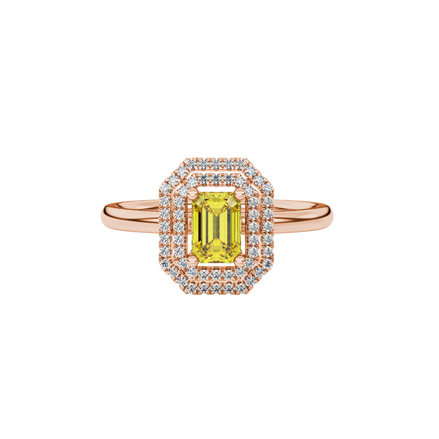 Emerald cut yellow gemstone double halo ring with octagonal diamond frame in gold