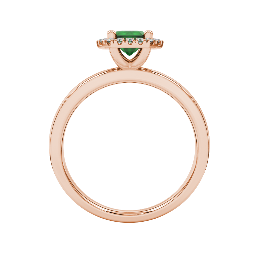 Green emerald cut gemstone halo ring with split shank band and diamond accents