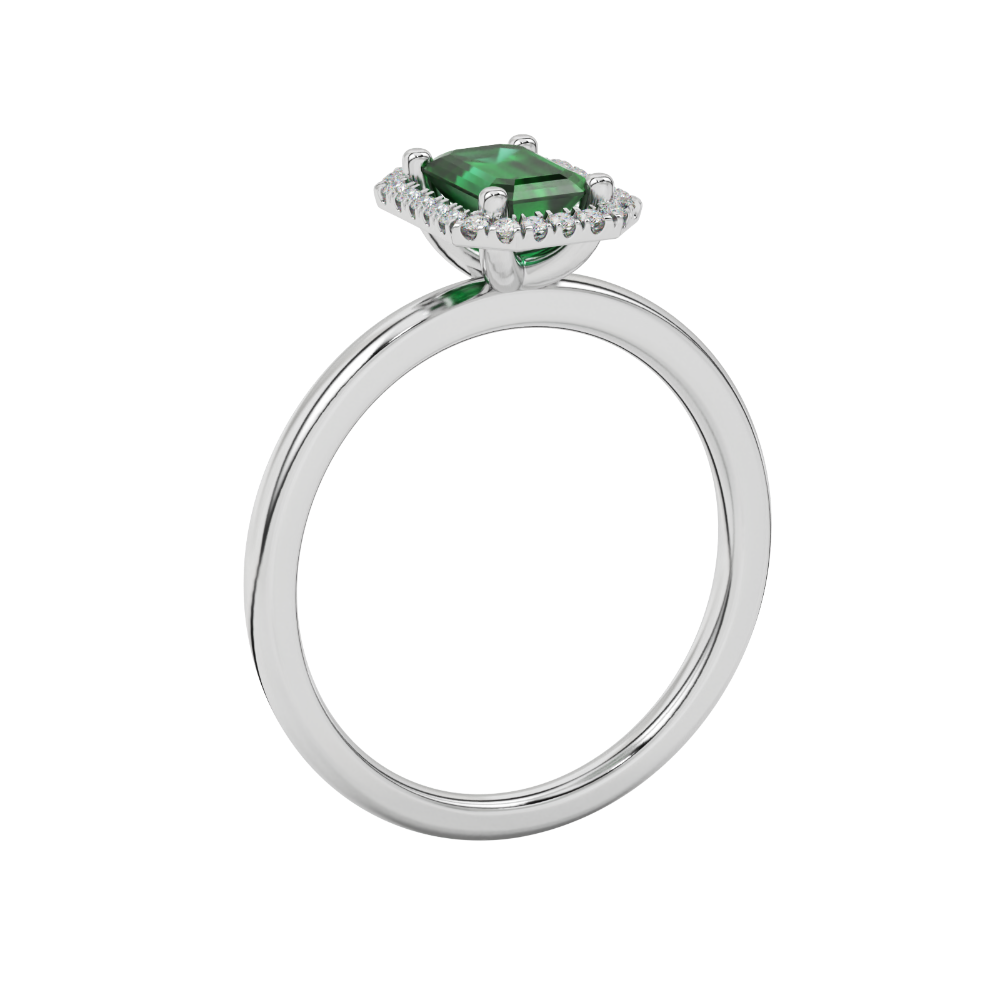 Green emerald cut gemstone halo ring with split shank band and diamond accents
