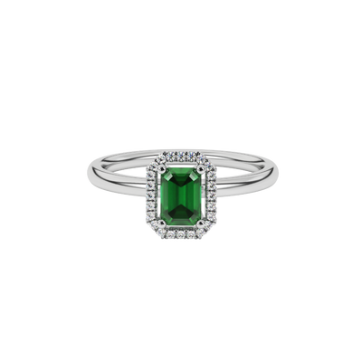 Green emerald cut gemstone halo ring with split shank band and diamond accents