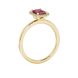 Red emerald cut gemstone halo ring with split shank band and diamond accents