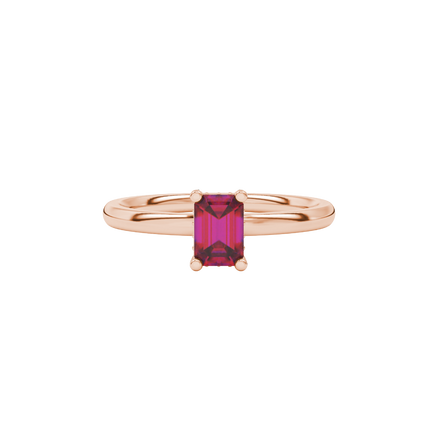 Emerald cut red gemstone halo ring with sparkling round diamond halo in rose gold