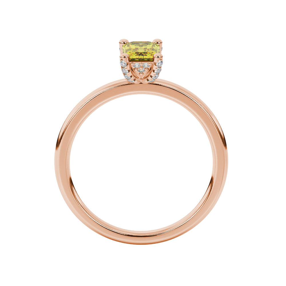 Emerald cut yellow gemstone halo ring with round diamond halo and polished gold band