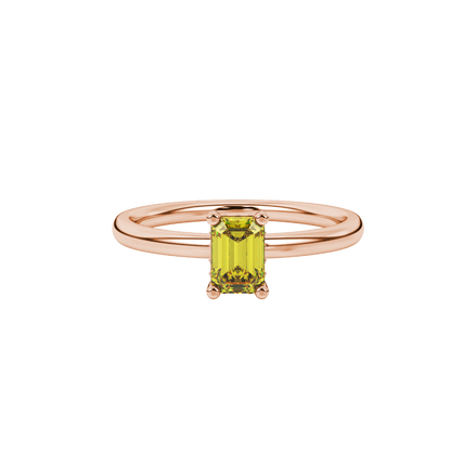 Emerald cut yellow gemstone halo ring with round diamond halo and polished gold band